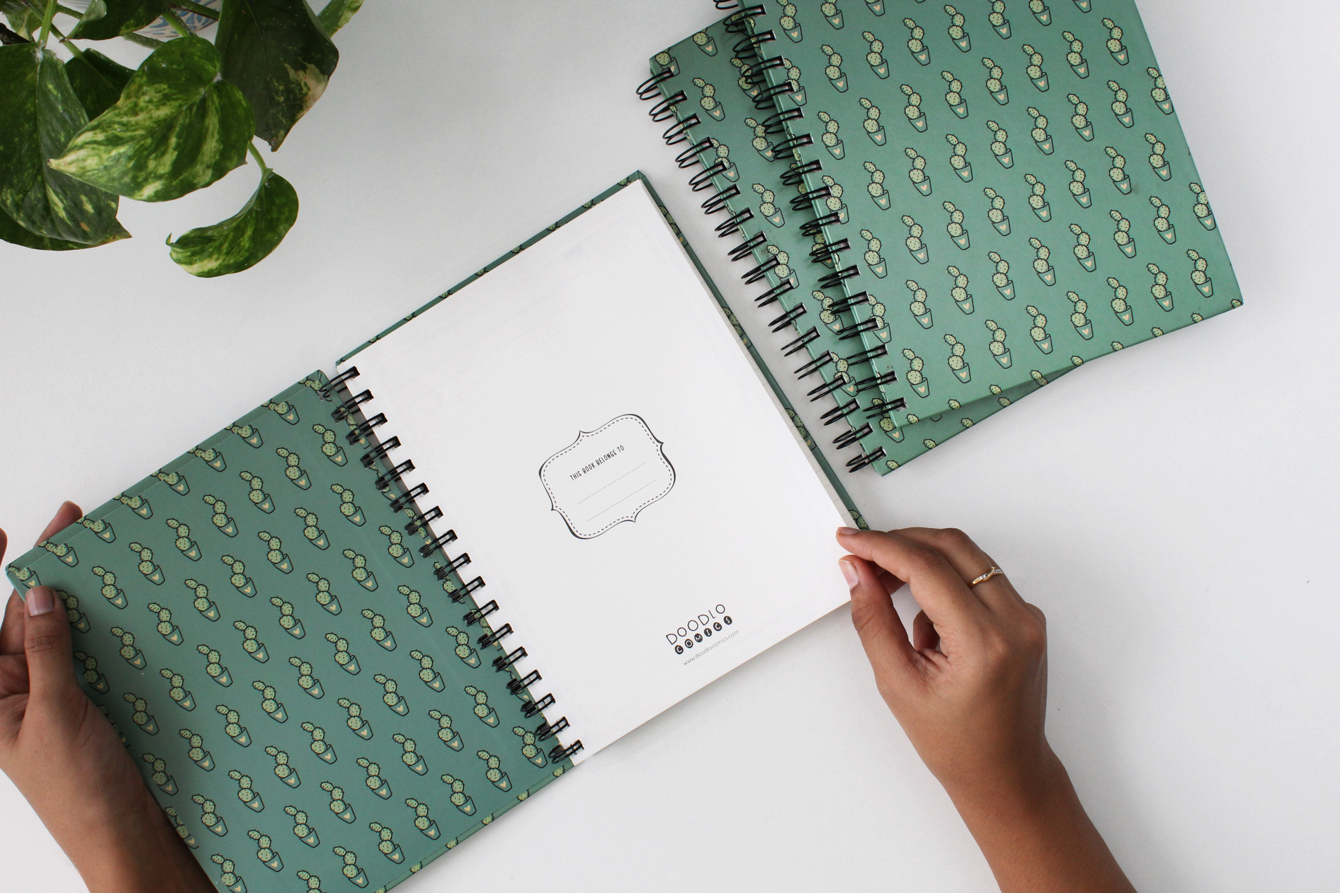 An open & closed notebook of 200 page spiral notebook