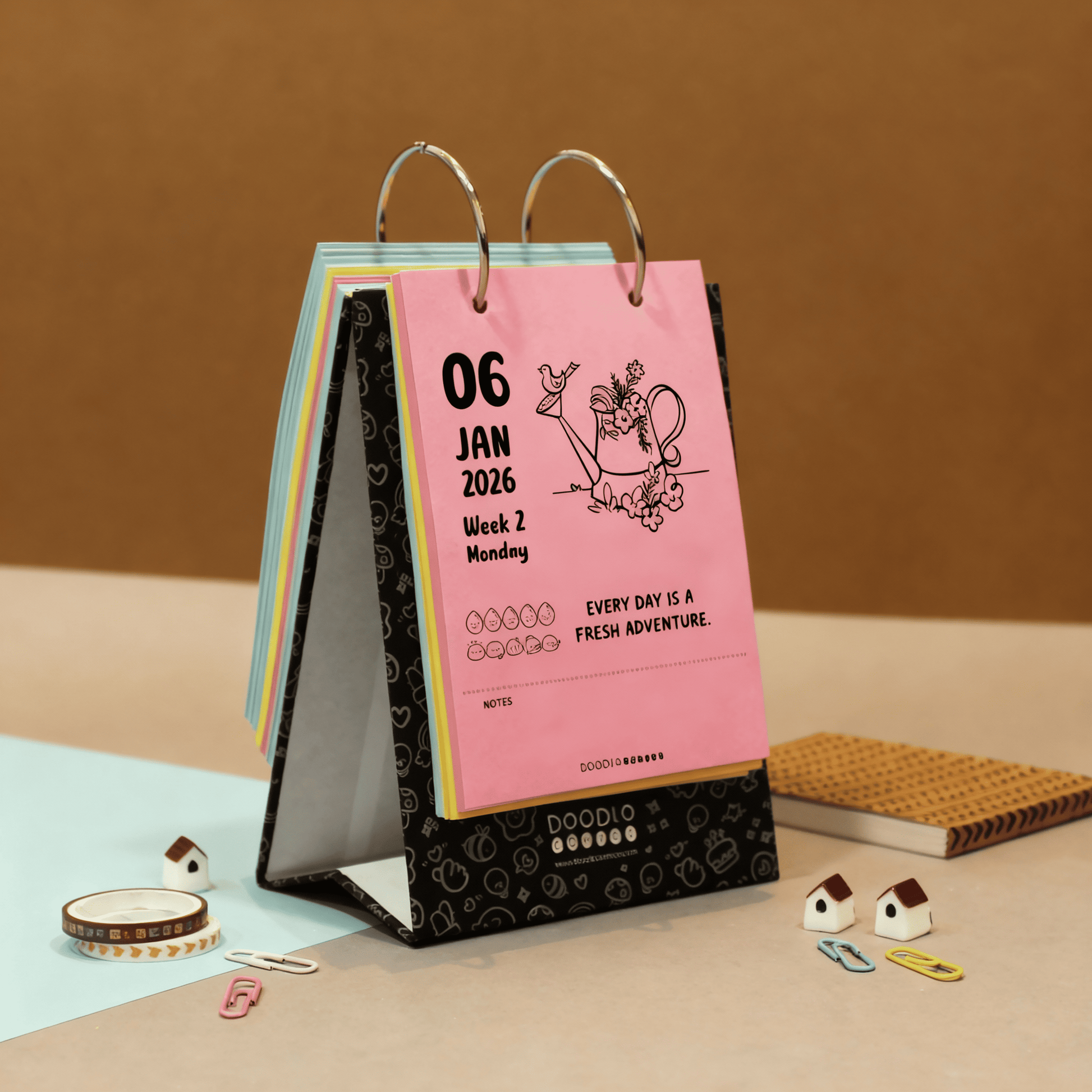 Premium table calendar 2026 with colorful pages and black designer base - unique corporate gift desk calendar with daily motivation