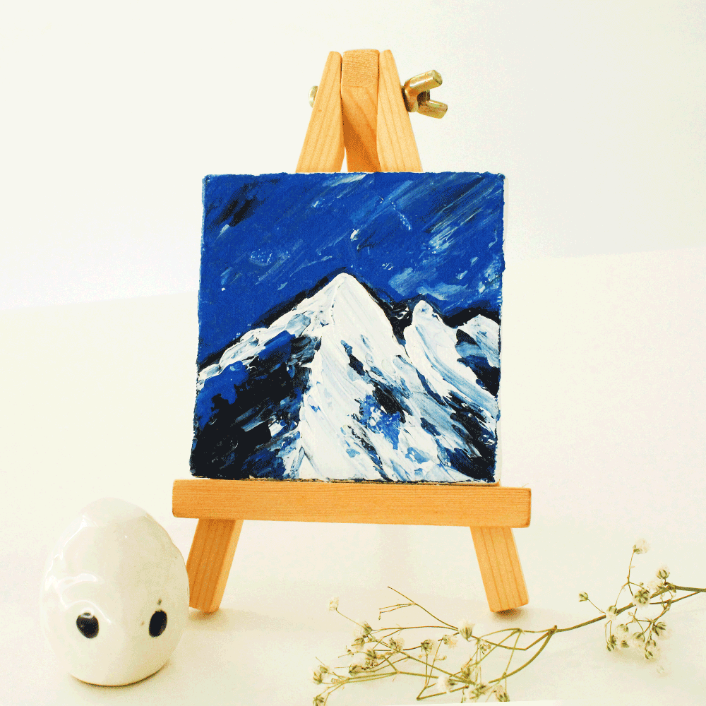 Mini canvas painting featuring blue mountain theme