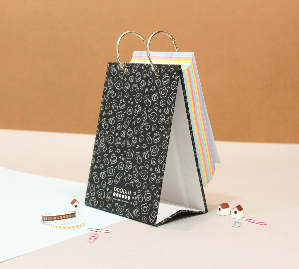 desktop calendar 2026 kept on table backside doodle arts with accessories